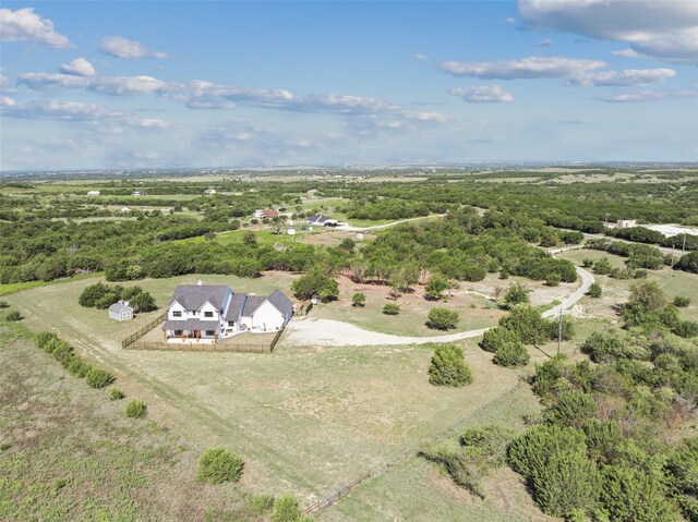 birds eye view of property featuring a rural view