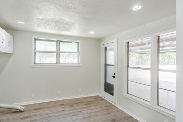 foyer entrance featuring light hardwood / wood-style flooring