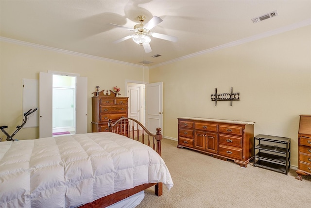 carpeted bedroom featuring crown molding and ceiling fan