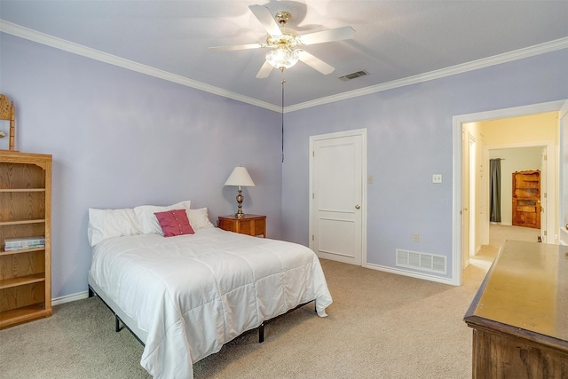 carpeted bedroom featuring ornamental molding and ceiling fan