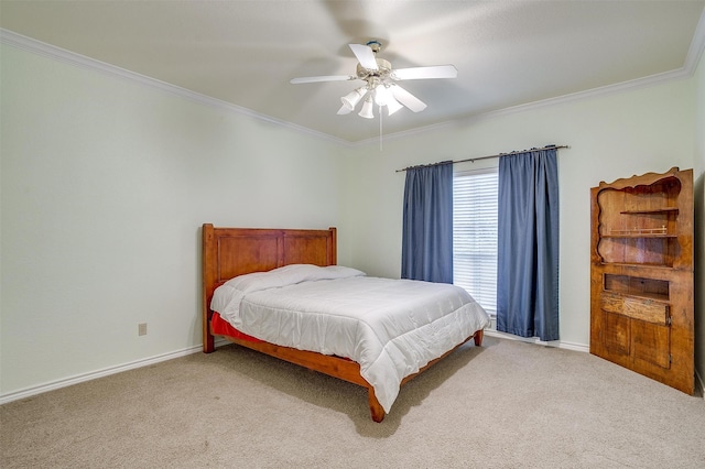 bedroom featuring ceiling fan, carpet flooring, and ornamental molding