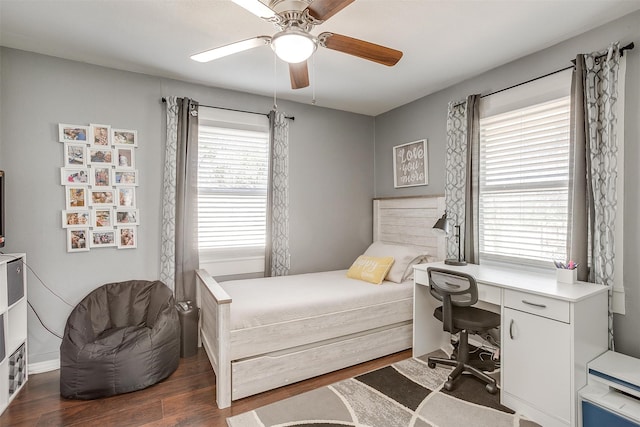 bedroom featuring ceiling fan and dark hardwood / wood-style flooring