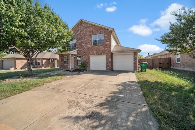 view of front facade featuring a front lawn and a garage