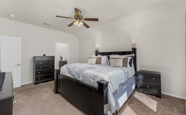 bedroom featuring lofted ceiling, ceiling fan, and light colored carpet