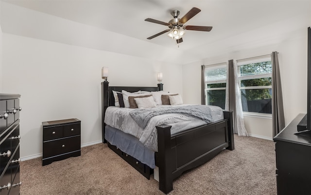 bedroom with light colored carpet and ceiling fan