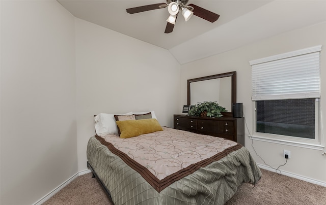 bedroom featuring lofted ceiling, carpet flooring, and ceiling fan