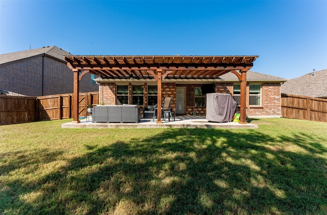 back of property with an outdoor hangout area, a patio, a lawn, and a pergola