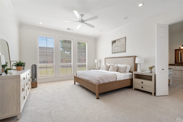 carpeted bedroom with ceiling fan, connected bathroom, and crown molding