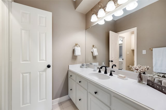 bathroom featuring tile patterned floors and vanity