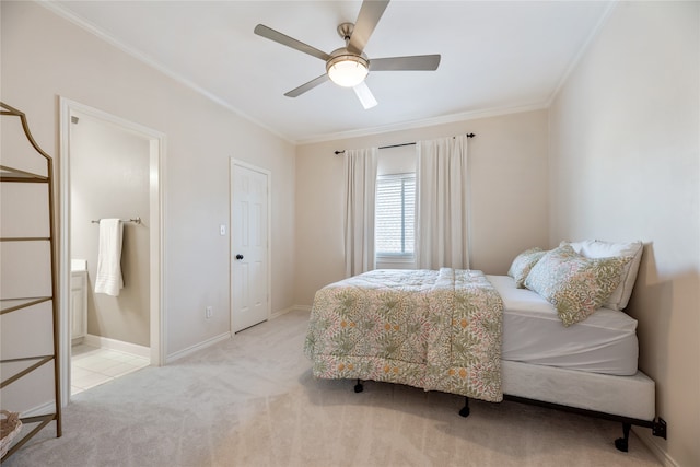 carpeted bedroom with crown molding and ceiling fan