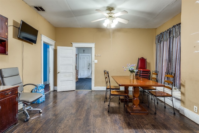 dining area featuring hardwood / wood-style flooring and ceiling fan