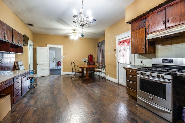 kitchen featuring decorative backsplash, dark hardwood / wood-style floors, stainless steel range with gas stovetop, ceiling fan with notable chandelier, and dark brown cabinets