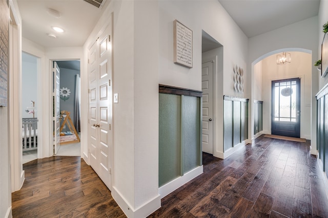 entryway featuring dark wood-type flooring