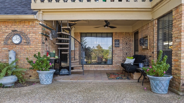 property entrance with ceiling fan