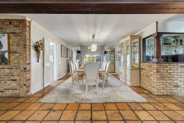 unfurnished dining area with crown molding and beam ceiling