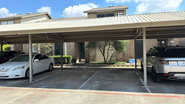 view of parking / parking lot with a carport