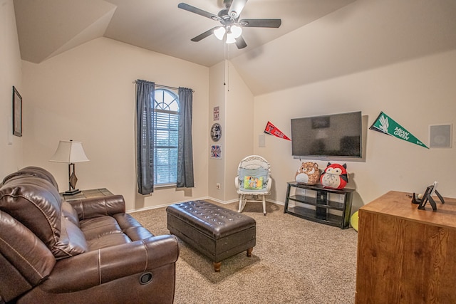 carpeted living room with ceiling fan and lofted ceiling