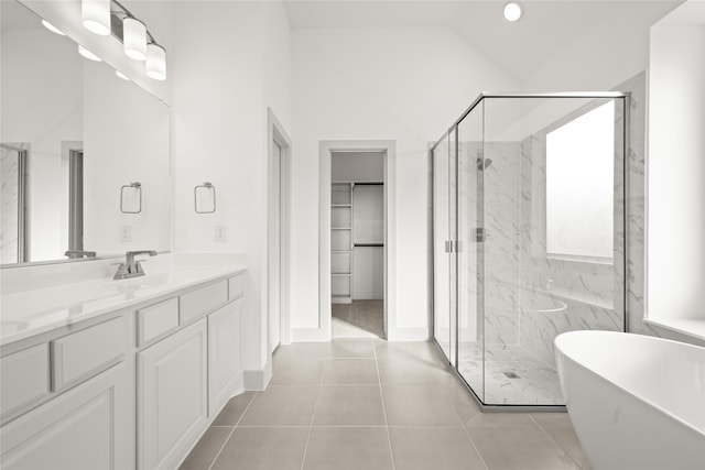 bathroom with vanity, plus walk in shower, high vaulted ceiling, and tile patterned flooring