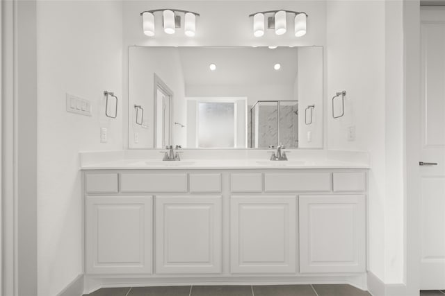 bathroom with vanity, tile patterned floors, and an enclosed shower