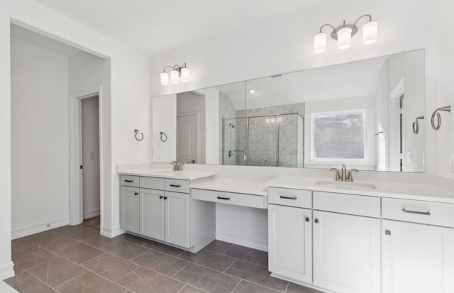 bathroom with vanity, tile patterned flooring, and an enclosed shower