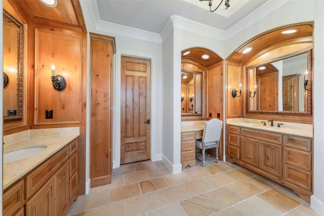 bathroom featuring vanity and ornamental molding