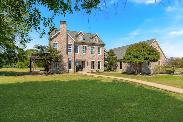 view of front of home with a front yard