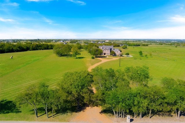 birds eye view of property with a rural view