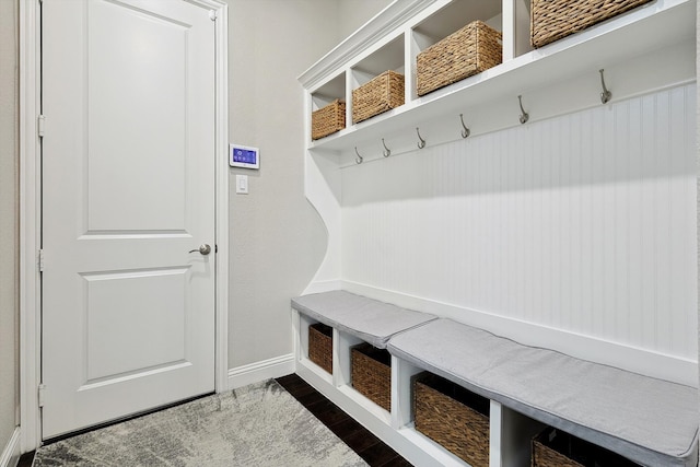 mudroom with dark hardwood / wood-style floors