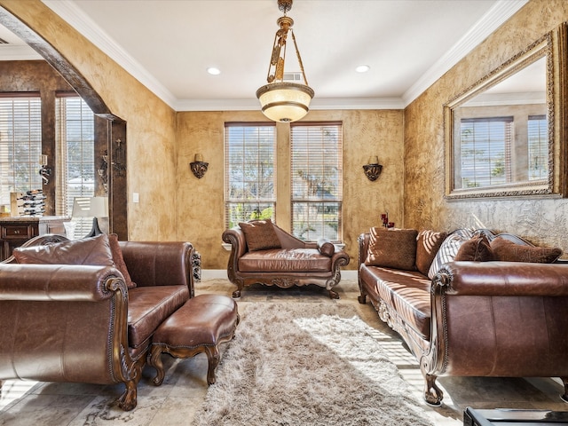 living room featuring crown molding and plenty of natural light