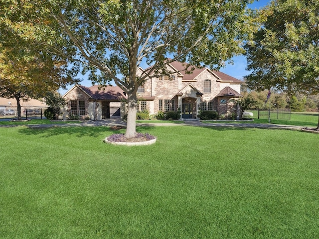 view of front of home with a front yard