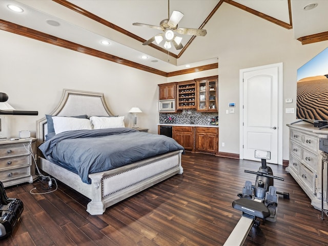 bedroom with ceiling fan, crown molding, and dark wood-type flooring