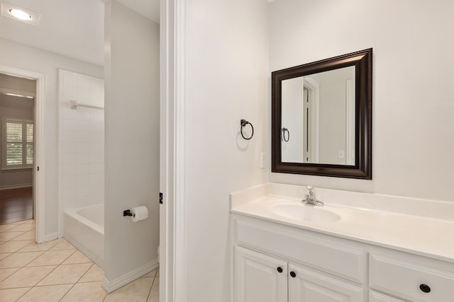 bathroom with tile patterned floors, vanity, and tub / shower combination