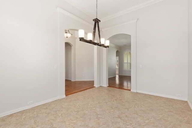 unfurnished dining area with ornamental molding and an inviting chandelier