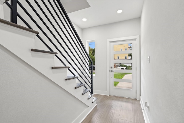 2507 Crossman Ave, Dallas, TX 75212 - entrance foyer with stairway, baseboards, wood finished floors, and recessed lighting