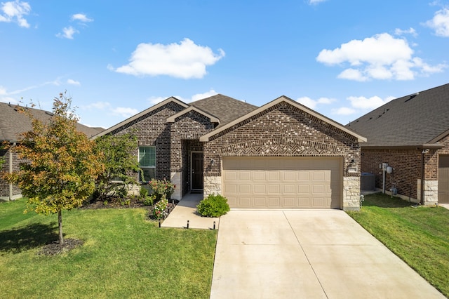 view of front facade with a front lawn and a garage