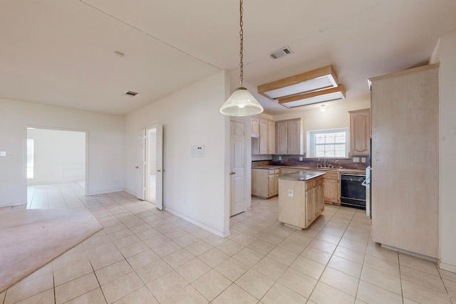 kitchen with a skylight, light brown cabinetry, black dishwasher, hanging light fixtures, and a center island