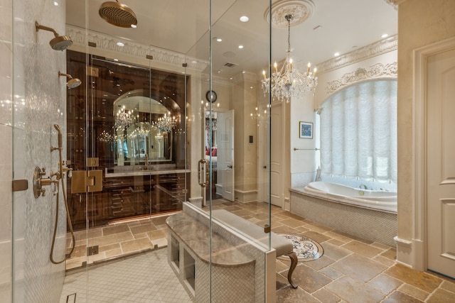 bathroom with crown molding, separate shower and tub, a chandelier, and vanity