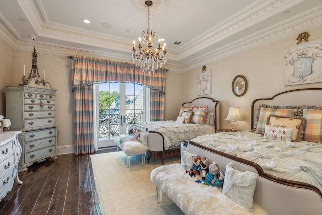 bedroom with access to outside, ornamental molding, a chandelier, a tray ceiling, and dark hardwood / wood-style flooring