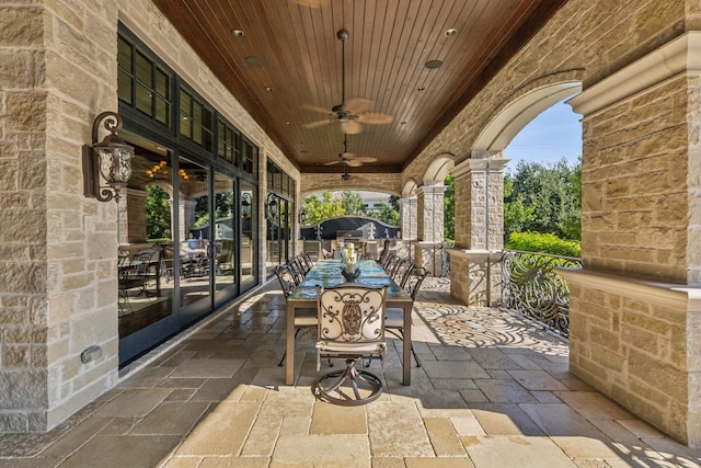 view of patio / terrace featuring ceiling fan