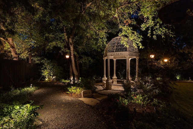 view of yard at twilight