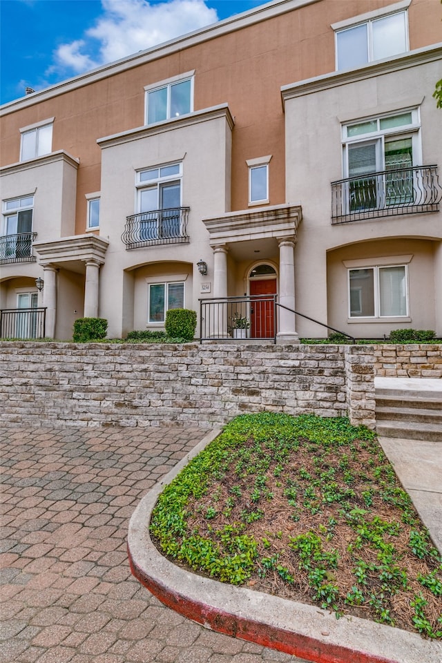 view of property featuring a balcony