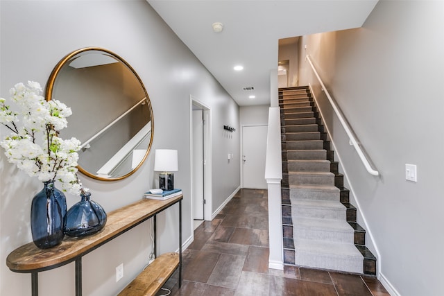 foyer featuring dark wood-type flooring