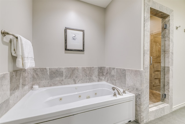 bathroom with tile patterned floors and plus walk in shower