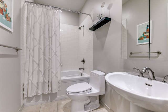 full bathroom featuring tile patterned floors, sink, toilet, and shower / bath combo