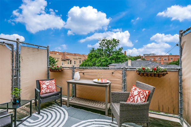 view of patio with a balcony