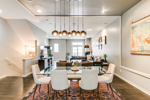 dining area with dark wood-type flooring