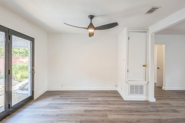 unfurnished room with light hardwood / wood-style flooring and ceiling fan