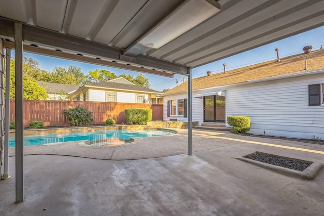 view of patio featuring a fenced in pool