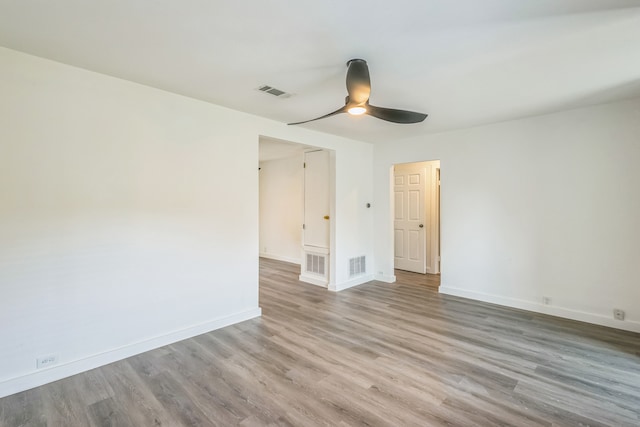 unfurnished room with light hardwood / wood-style flooring and ceiling fan