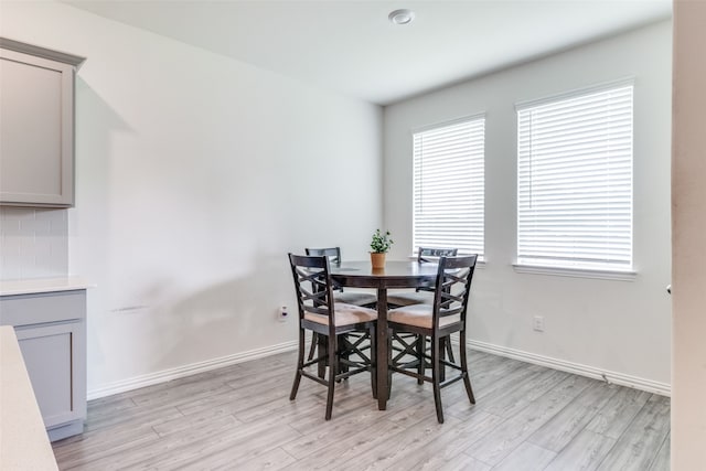 dining room featuring light hardwood / wood-style flooring